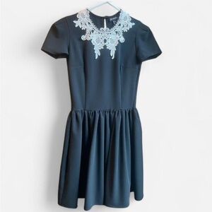 Deandri lace roselle dress with pockets.